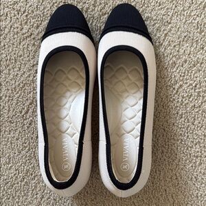 Elegant Black and White Heels with Classic Design